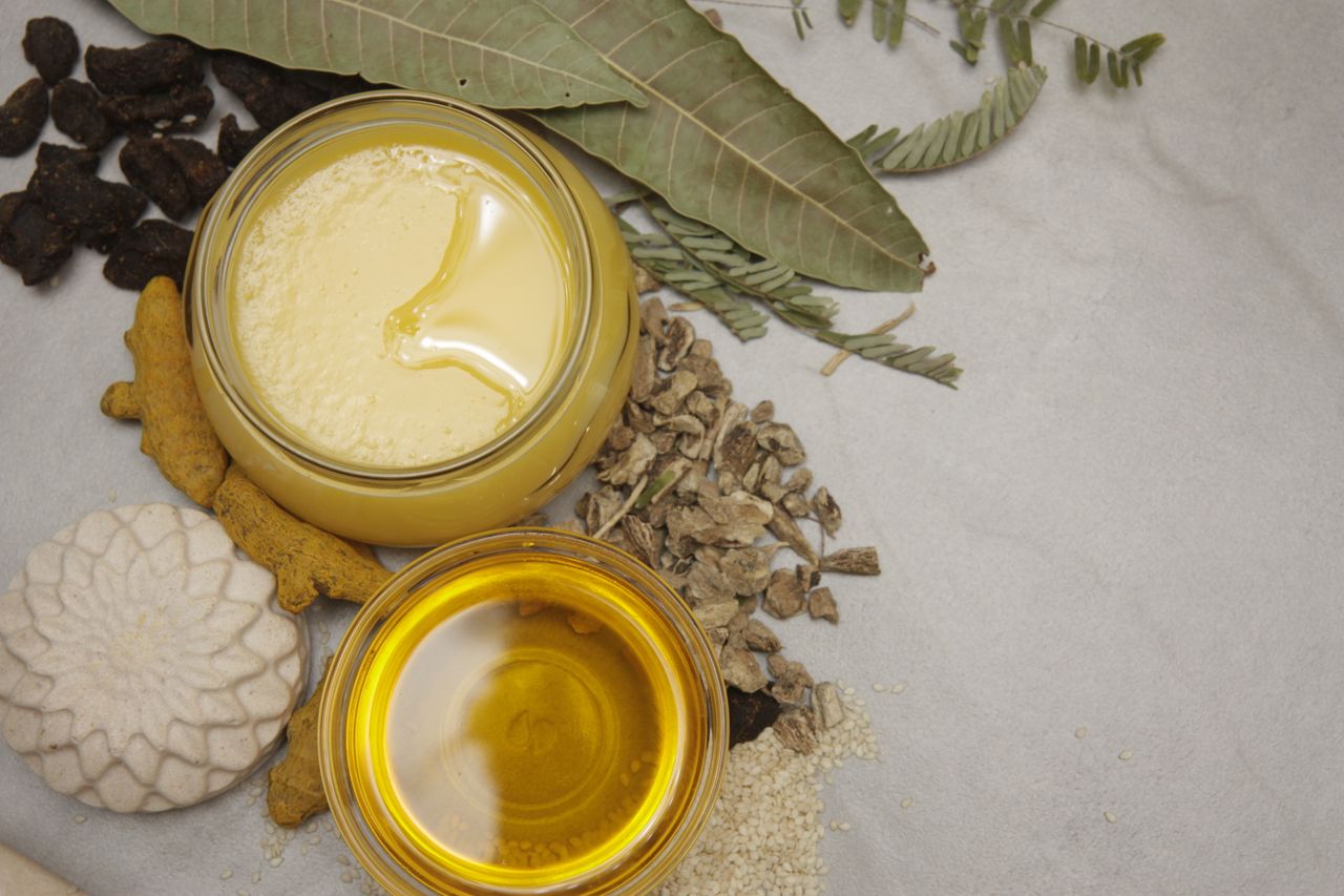 about-us-02 Flat lay of natural ingredients, herbs, and honey jars showcasing a healthy lifestyle and wellness theme.